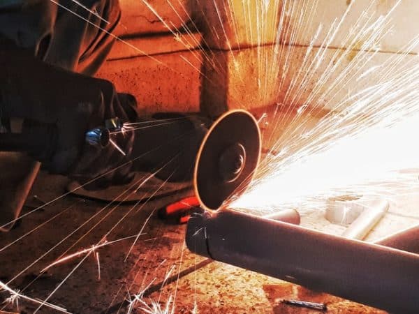 Abrasive Wheel cutting metal sparks flying